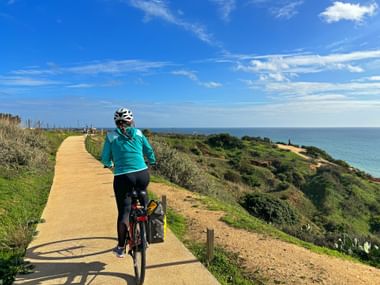 Cyclist on the coast