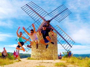 Havin fun in front of a mill in the province Provence