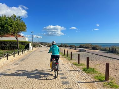 Cyclist on a quiet coastal path