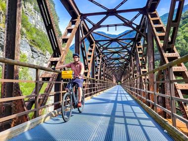 Cyclist crosses bridge