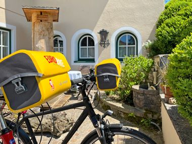 Eurobike rental bike PLUS with yellow handlebar bag