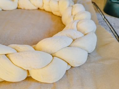Braided Striezel on the tray before baking