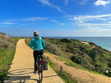 Cyclist on the coast Cyclist on the coast