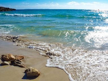 White sandy beach and turquoise sea near Colònia de Sant Jordi