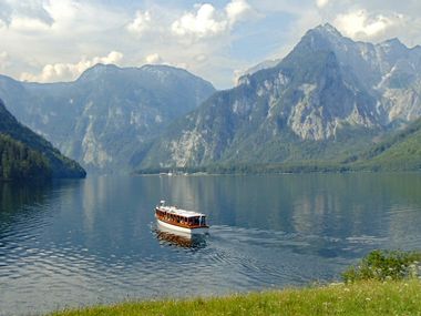 Boat at Königssee with mountain backdrop