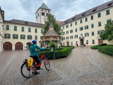 Active holidaymaker with rental bike at Neustift Monastery