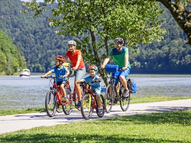 Family on the cycle path on the banks of the Danube