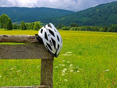 Helmet on the wooden fence