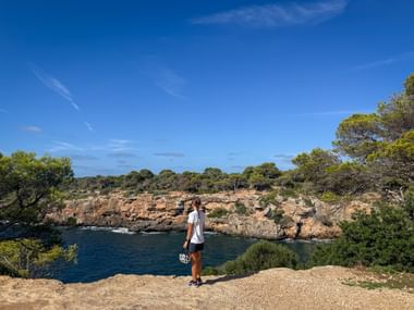 Cyclist in Torre de Cala Pi