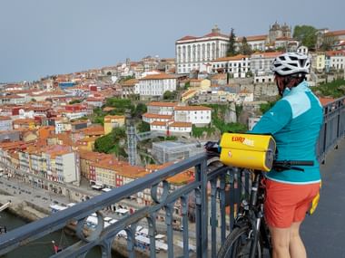 Cyclist enjoys her favourite spot on the bridge in Porto