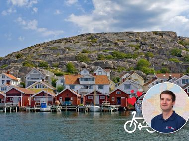 Houses in front of rocks in Sweden, portrait of employee