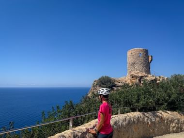 Cyclist enjoys the view at Torre del Verger