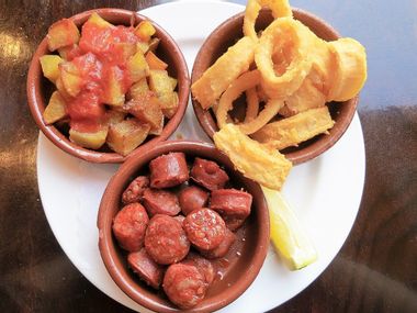 Patatas bravas, Chorizo and calamars