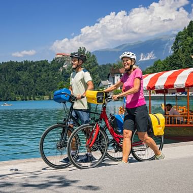 two cyclists in Bled in Slovenia