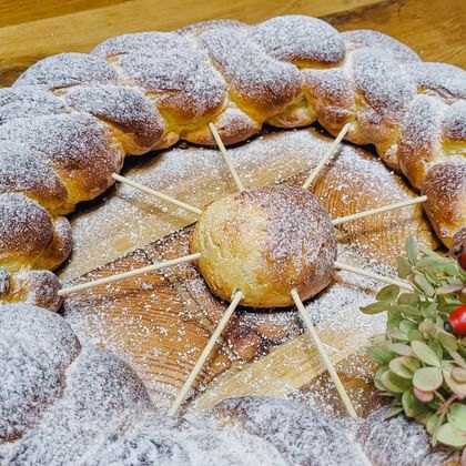 All Saints' Striezel in the shape of a wheel with flower decoration