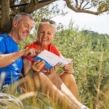 Couple takes a look at the travel documents
