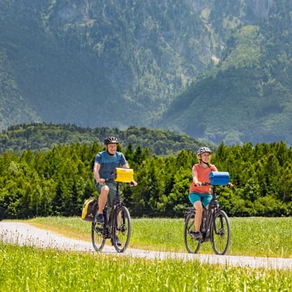 Cyclists with view on the mountain Untersberg