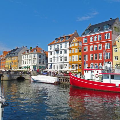 Boats and colourful houses in Nyhavn in Copenhagen