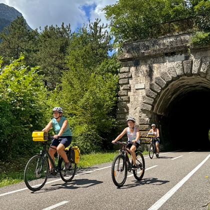 A family on the cycle path in the Kanaltal valley