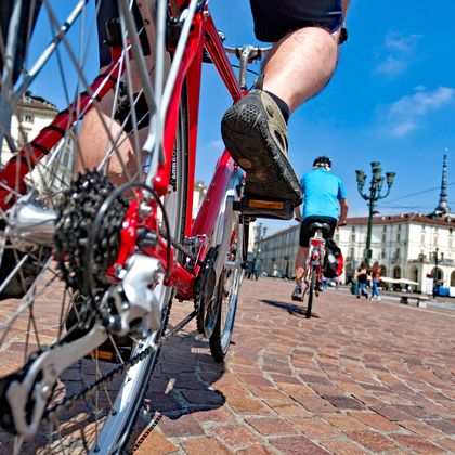 Cyclist at Piazza Vittorio Veneto in Turin