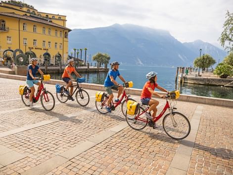 Cyclists in the centre of Riva on the lakeshore