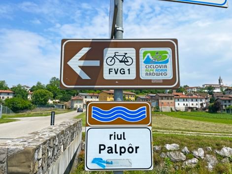 Signposts on the Alpe-Adria cycle path