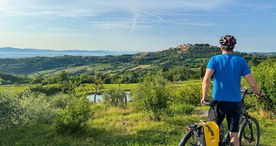 Cyclist enjoys the view of Montepulciano