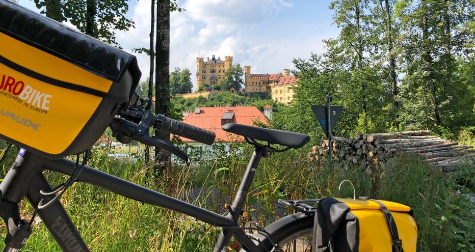 View of Hohenschwangau with a bicycle in the foreground