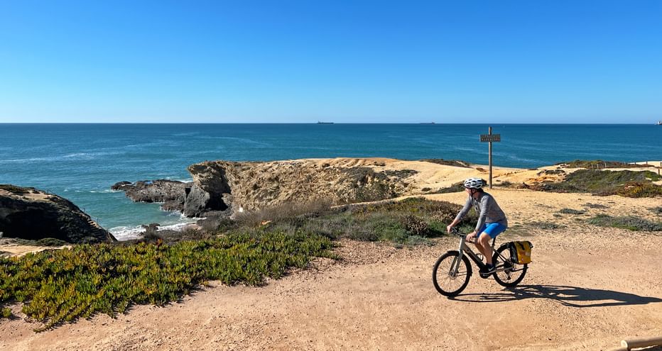 Cyclist at Praia naturista