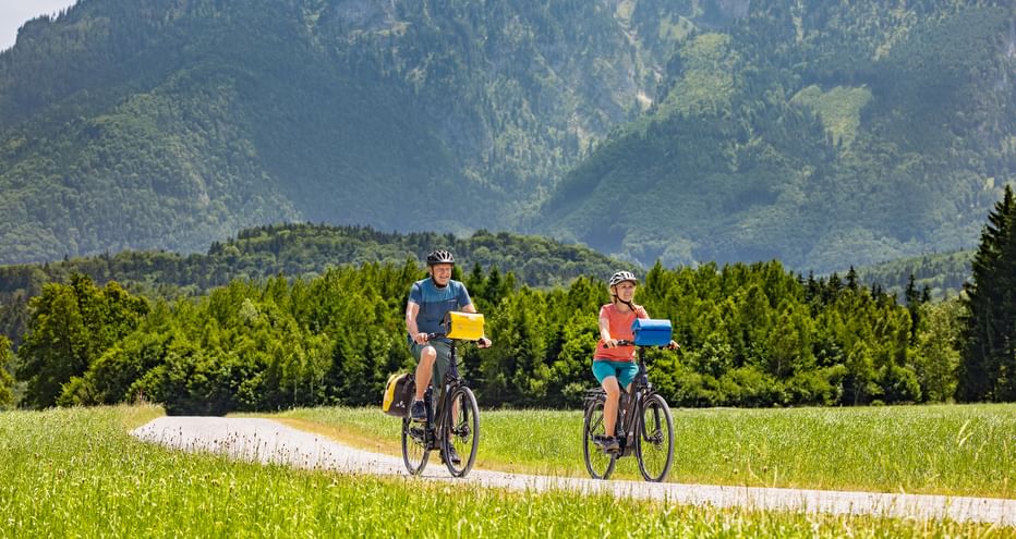 Cyclists with view on the mountain Untersberg