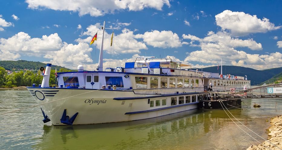 MS Olmpia at a pier on the Rhine River