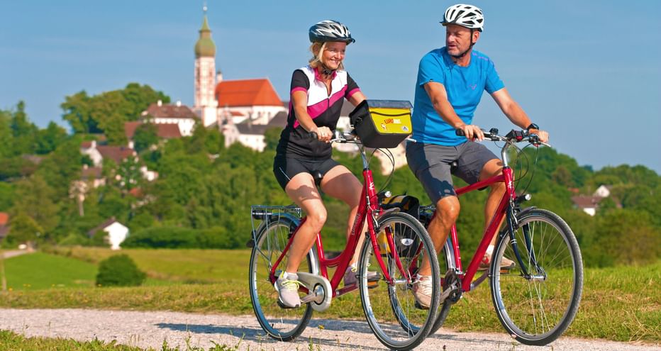 Cyclists in front of Andechs Monastery