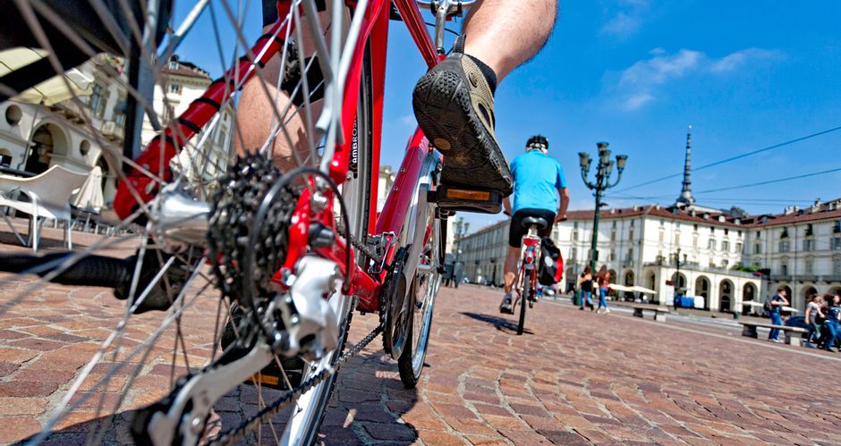 Cyclist at Piazza Vittorio Veneto in Turin